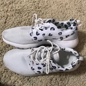 White leopard Nike shoes